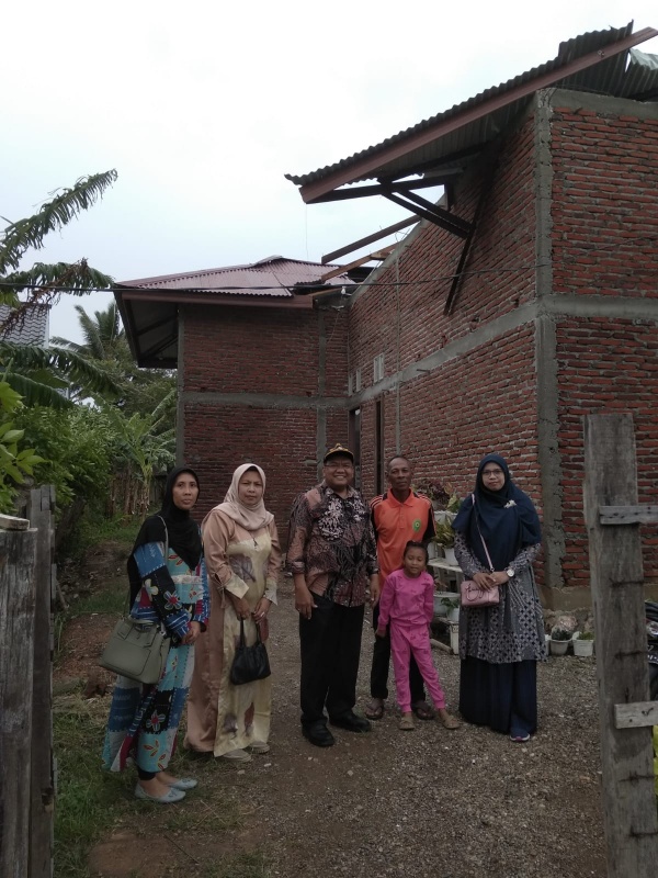 BENCANA BADAI MERUSAK ATAP RUMAH STAF PT BANDA ACEH
